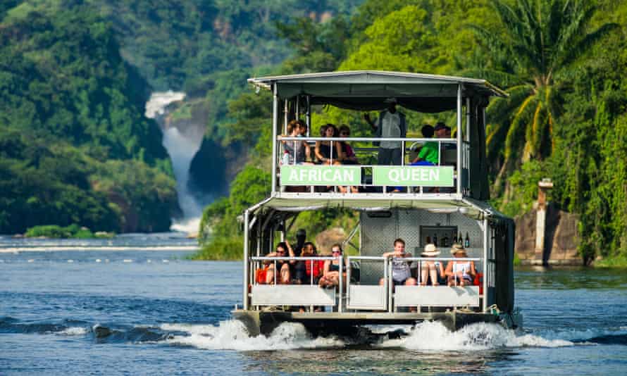 A tour boat approaching Murchison Falls, a popular destination for tourists in Uganda