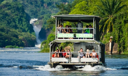 A tour boat approaching Murchison Falls, a popular destination for tourists in Uganda 