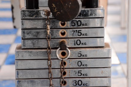 Close-up of gym fitness machine with weights