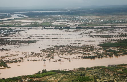 Aerial view shows flood waters from SomaliaâÂÂs overflowing Juba river submerging fields and trees