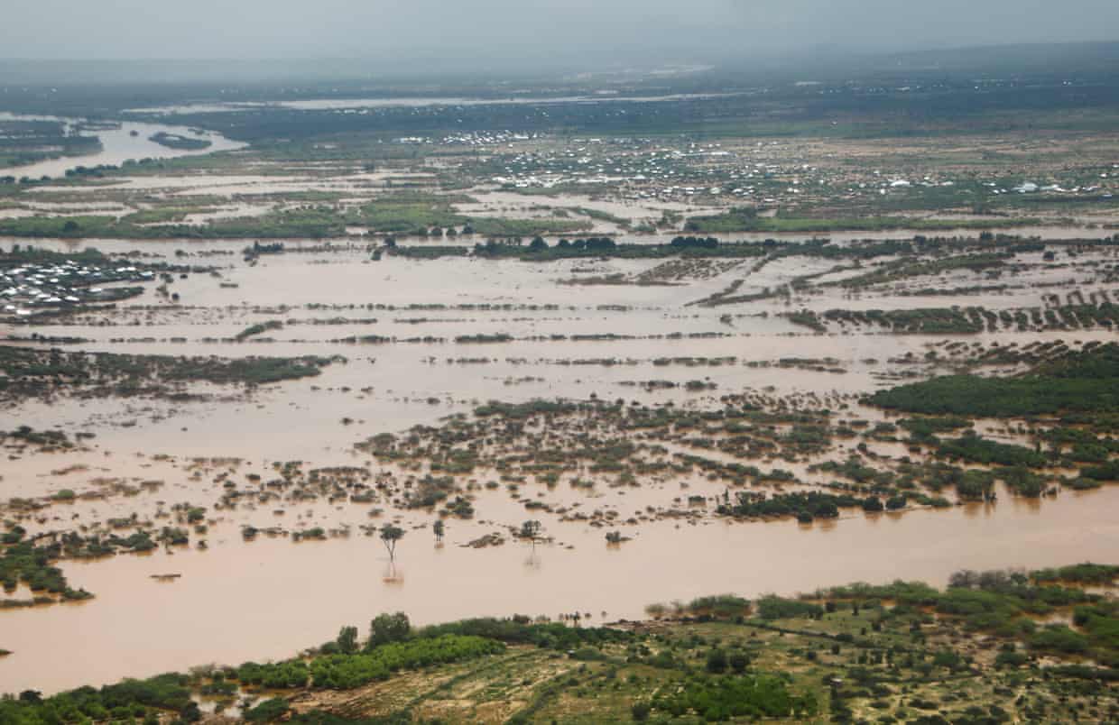 Aerial view shows flood waters from Somalia’s overflowing Juba river submerging fields and trees