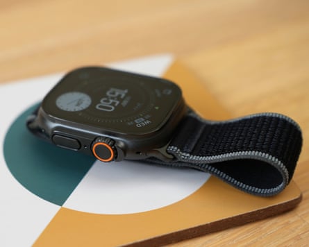 The side button and digital crown of the Apple Watch Ultra 3 in black.