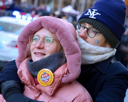 New Yorkers watch a live broadcast of Zohran Mamdani’s speech.