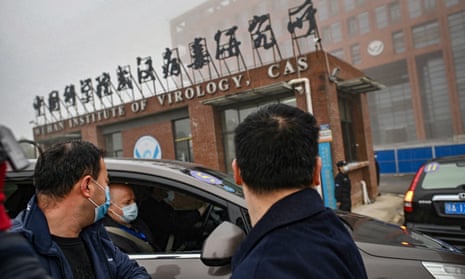 Members of the WHO team investigating the origins of Covid-19 arrive at the Wuhan institute of virology in Hubei province on 3 February.