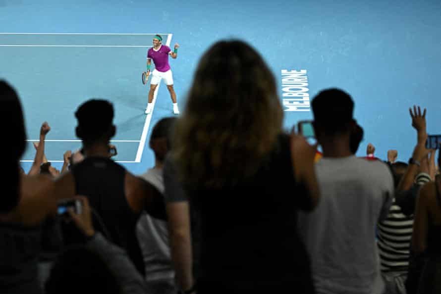 The crowd rise to congratulate Rafa Nadal after his four-set victory took him a match away from becoming the first man to win 21 grand slams.