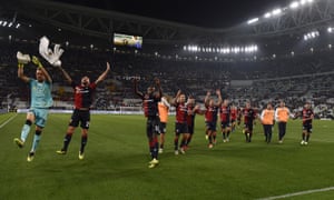 Genoa players greet their fans after their 1-1 draw at Juventus.