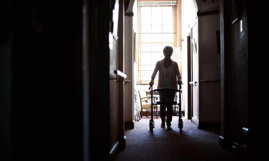 Silhouette of a senior using a walker