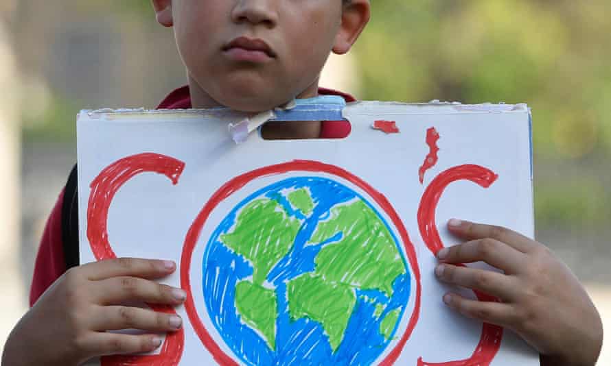 A young person at a climate protest outside Parliament in London, 8 September 2021.