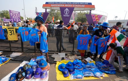 Vendors sell cricket merchandise at Narendra Modi stadium on the eve of the men’s cricket World Cup final between India and Australia.