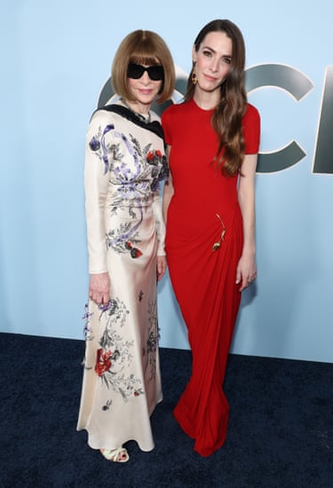 Anna Wintour attends with her daughter, who is wearing a red gown