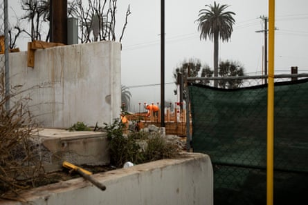 Recovery efforts underway in Pacific Palisades in December 2025.