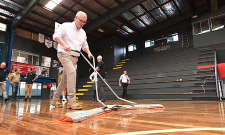 Scott Morrison drying a basketball court