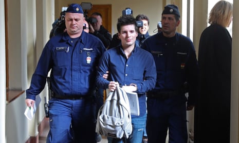 Rui Pinto pictured with judicial officers in Budapest in March 2019.