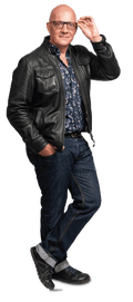 A man in a blue shirt, black leather jacket and blue jeans