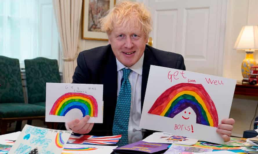 Boris Johnson displaying his Get Well Soon cards sent in by children while he was ill with Covid-19