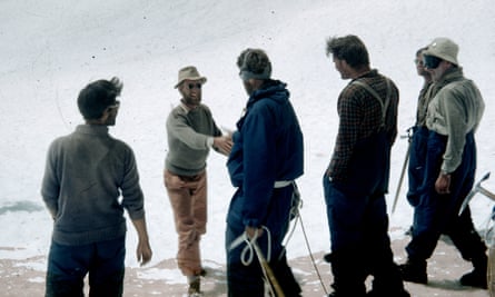 James (now Jan) Morris shaking Edmund Hillary's hand on a snowy slope