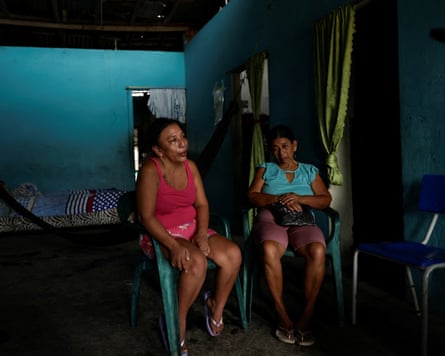 Two women sitting in chairs