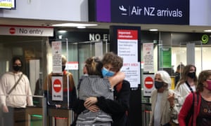 Families reunite at Auckland Domestic Airport on 15 December. New Zealand will now push back the start of its quarantine-free border reopening for its citizens returning from Australia.