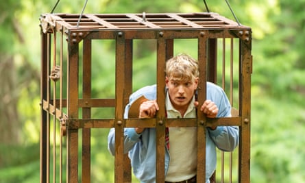 Jack in a cage hanging from a tree