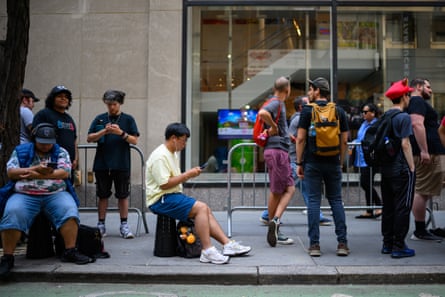 People wait in line for store to open