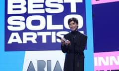 Troye Sivan accepts the award for best solo artist during the 2023 Aria awards in Sydney