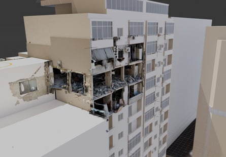 A digital model of three damaged floors of an apartment block