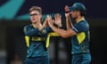 Adam Zampa celebrates with Marcus Stoinis after taking one of his four wickets