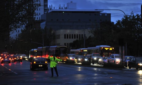 Police direct traffic around Adelaide’s CBD after a statewide blackout following a major storm last year. The episode led to the government blaming the network’s problems on the state’s high uptake of wind power. 