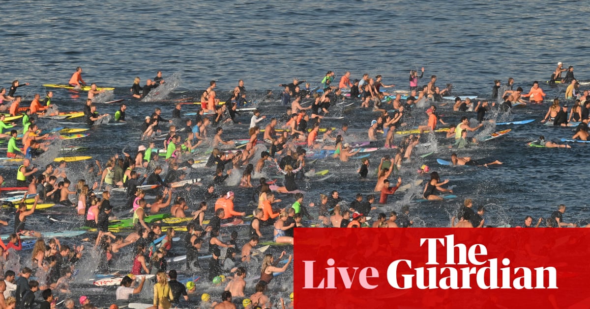 Australia news live: thousands join paddle-out in honour of Bondi victims; Coalition calls for new powers to strip citizenship