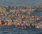 Australia news live: thousands join paddle-out in honour of Bondi victims; Coalition calls for new powers to strip citizenship