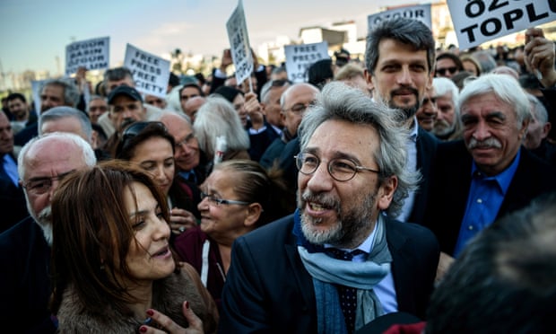 Can Dündar, editor-in-chief of Cumhuriyet daily newspaper, arrives at the Istanbul courthouse for his trial on 1 April 2016
