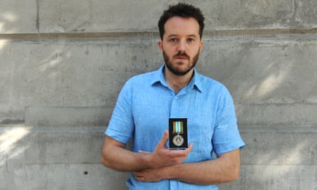 Neal Russell with his Ebola medal