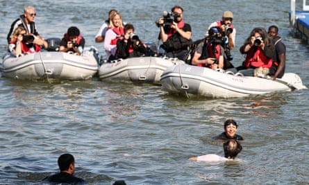 Photographers on boats capture Anne Hidalgo’s swim in the Seine