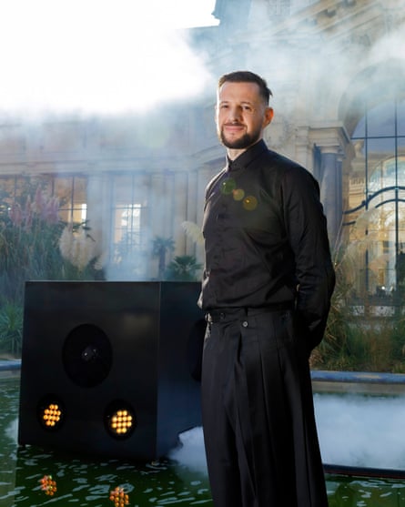 French artist Loris Gréaud poses in front of his work Physarum (2023) at Petit Palais.