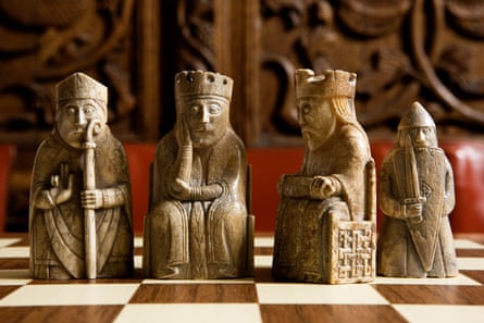 The Lewis ChessmenA bishop; a queen; a king and a berserker rook or castle made from the walrus ivory and whales teeth - part of the medieval Lewis Chess Sets.