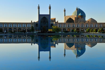 Reflection of Emam Mosque on the water at Imam Square, Isfahan, Iran.