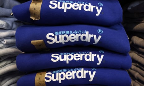 Superdry returns to profit despite talks on £70m overdraft