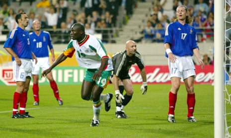 Senegal's Papa Bouba Diop reels away in celebration after scoring Senegal’s goal against France.