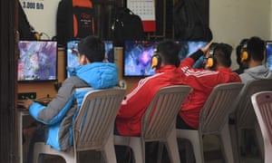 High school students play online games at a shop in Hanoi.