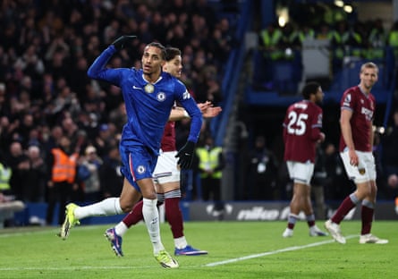 João Pedro urges on the crowd and his teammates after pulling a goal back for Chelsea