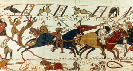 Norman cavalry attacking the English with spears and swords in the tapestry.