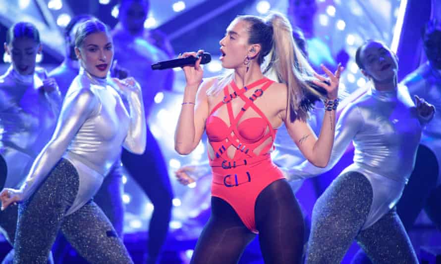 Dua Lipa performing on stage