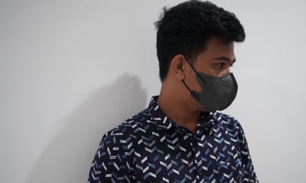Rahim (a pseudonym) wearing a mask