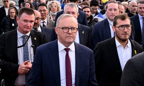 Australia's Prime Minister Anthony Albanese walks with members of the Melbourne Jewish community
