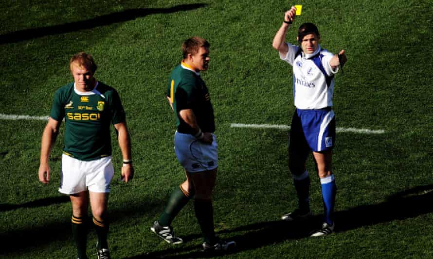 South Africa’s Schalk Burger (left) is shown a yellow card after eye-gouging Luke Fitzgerald during the second Test in 2009.