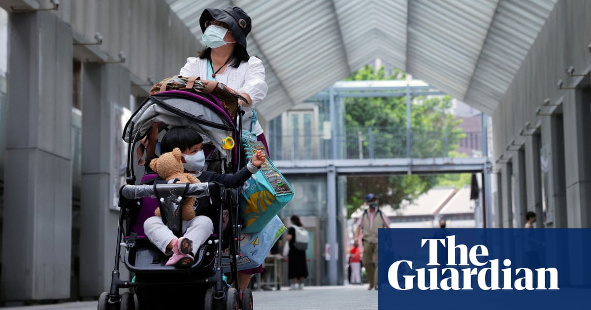 Taiwan won’t go into lockdown like Shanghai despite Covid surge, premier says - The Guardian
