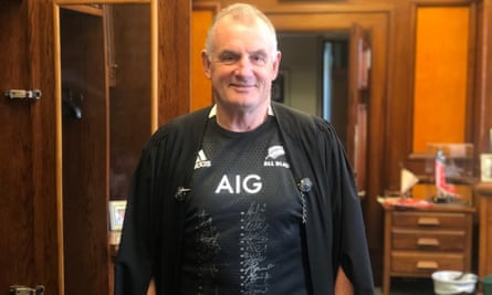 New Zealand speaker of the house Trevor Mallard showing off his All Blacks supporters jersey under his speaker’s robes