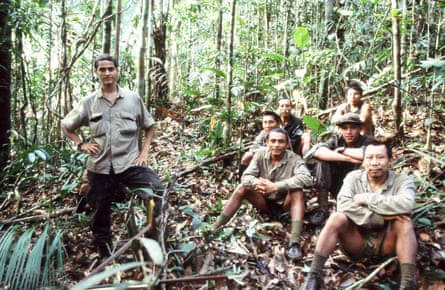 Amarildo and Orlando Possuelo pose for a photo in the forest with other members of the expedition