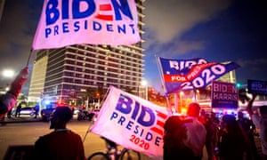Supporters gather in Miami as Joe Biden’s election campaign arrives for Monday’s town hall.