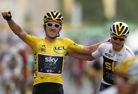 Thomas celebrates with Froome as he crosses the finish line.
